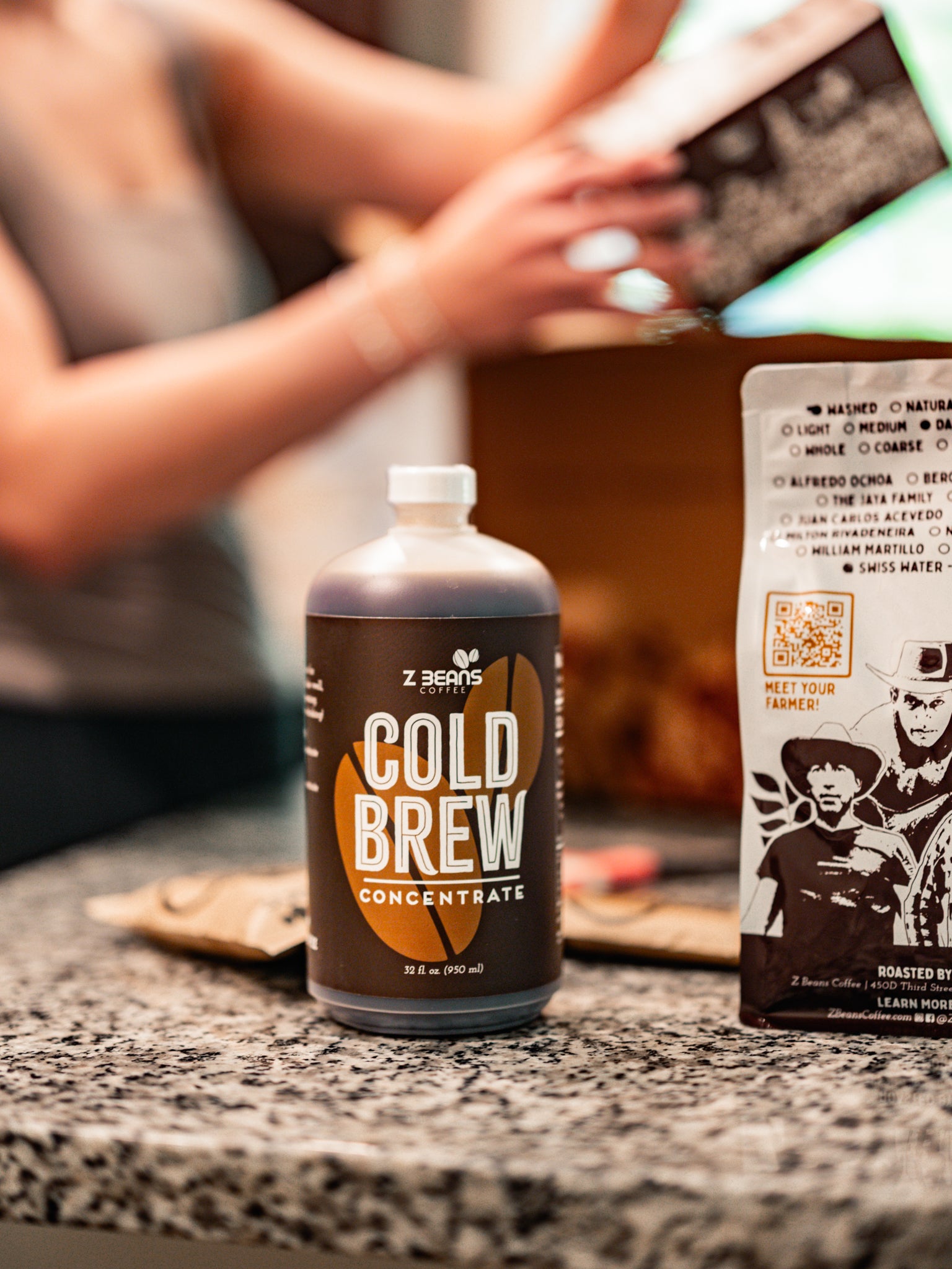Cold brew concentrate bottle with packaging on a countertop