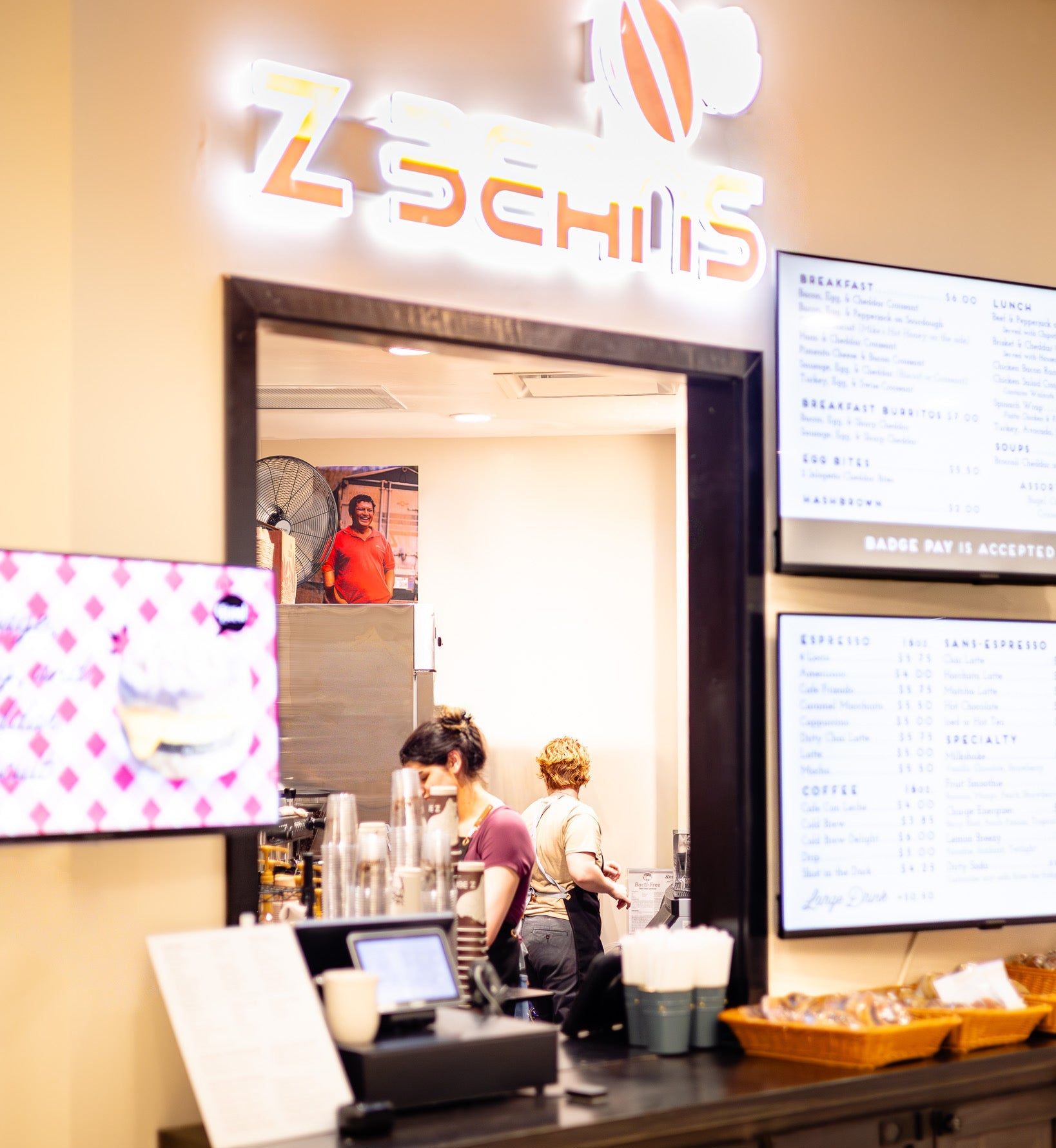 Cafe ordering window with lighted Z Beans sign and menu boards